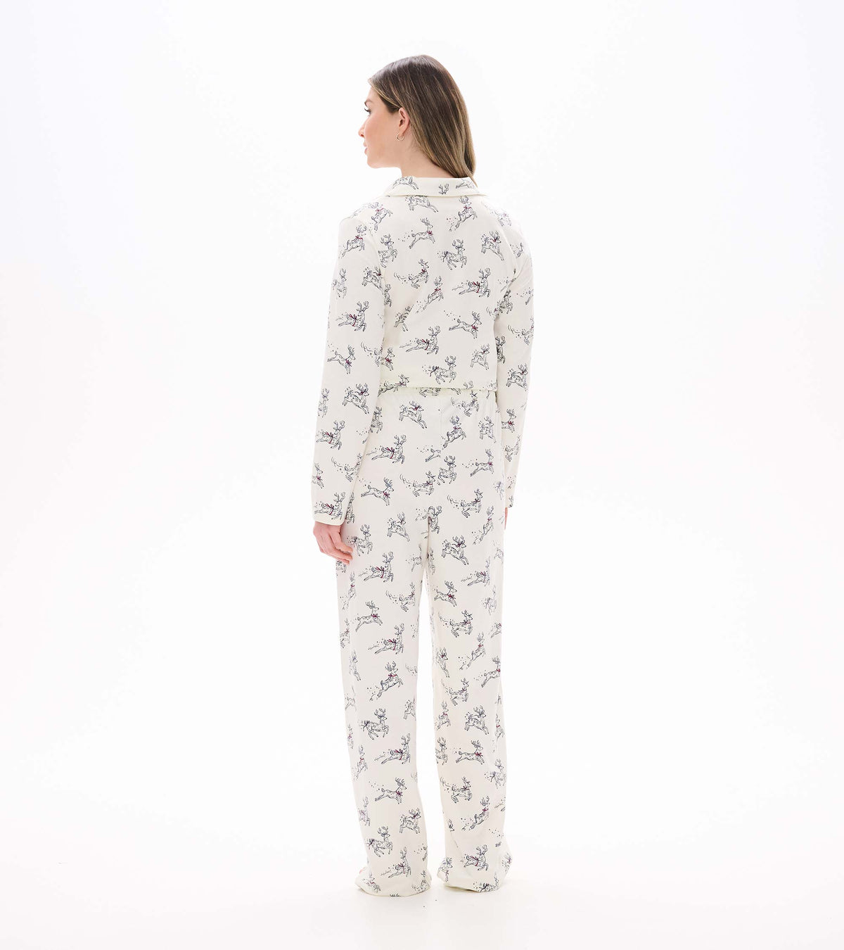 Back view of ivory pajama set with long sleeves and allover prancing reindeer print