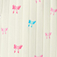 Cream curtains with pink and blue butterfly prints