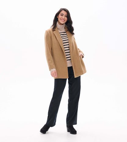 Full-length front view of burro brown open jacket on model
