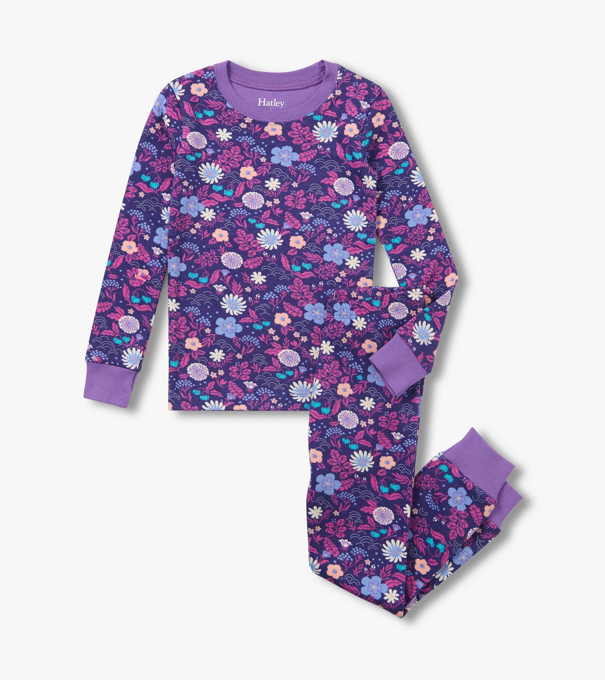 Kids pajama set with purple floral print, long-sleeve top, fitted pants, and lavender cuffs