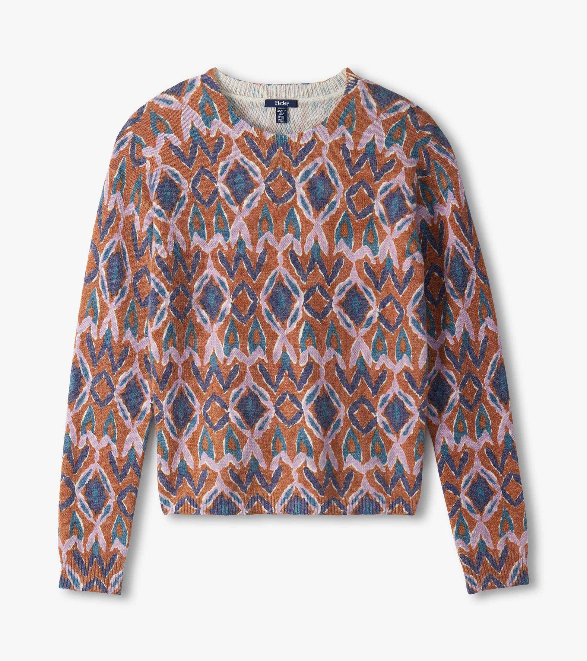 Flat lay of Noa sweater with allover textured ikat pattern in pink, brown, blue and teal
