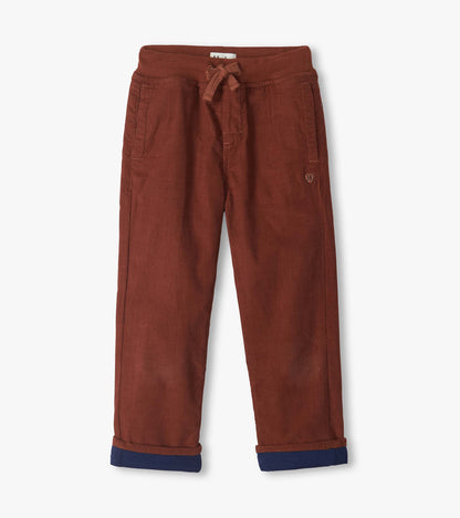 Front view of tortoise brown pull-on pants with drawstring waist, front pockets, and rolled cuffs