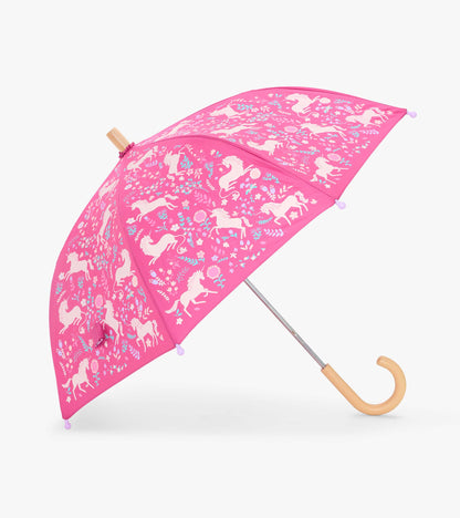 Open pink kids umbrella with white unicorn and floral print, curved wooden-look handle