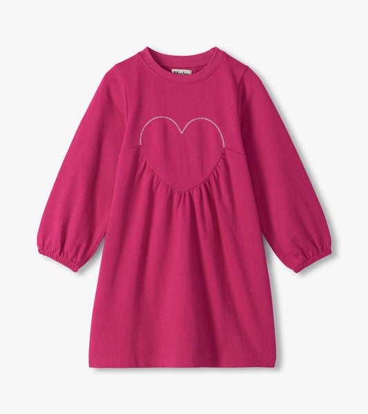 Berry pink girls dress with long sleeves, gathered skirt, and heart applique detail on the chest