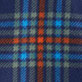 Blue plaid pattern with orange and white stripes