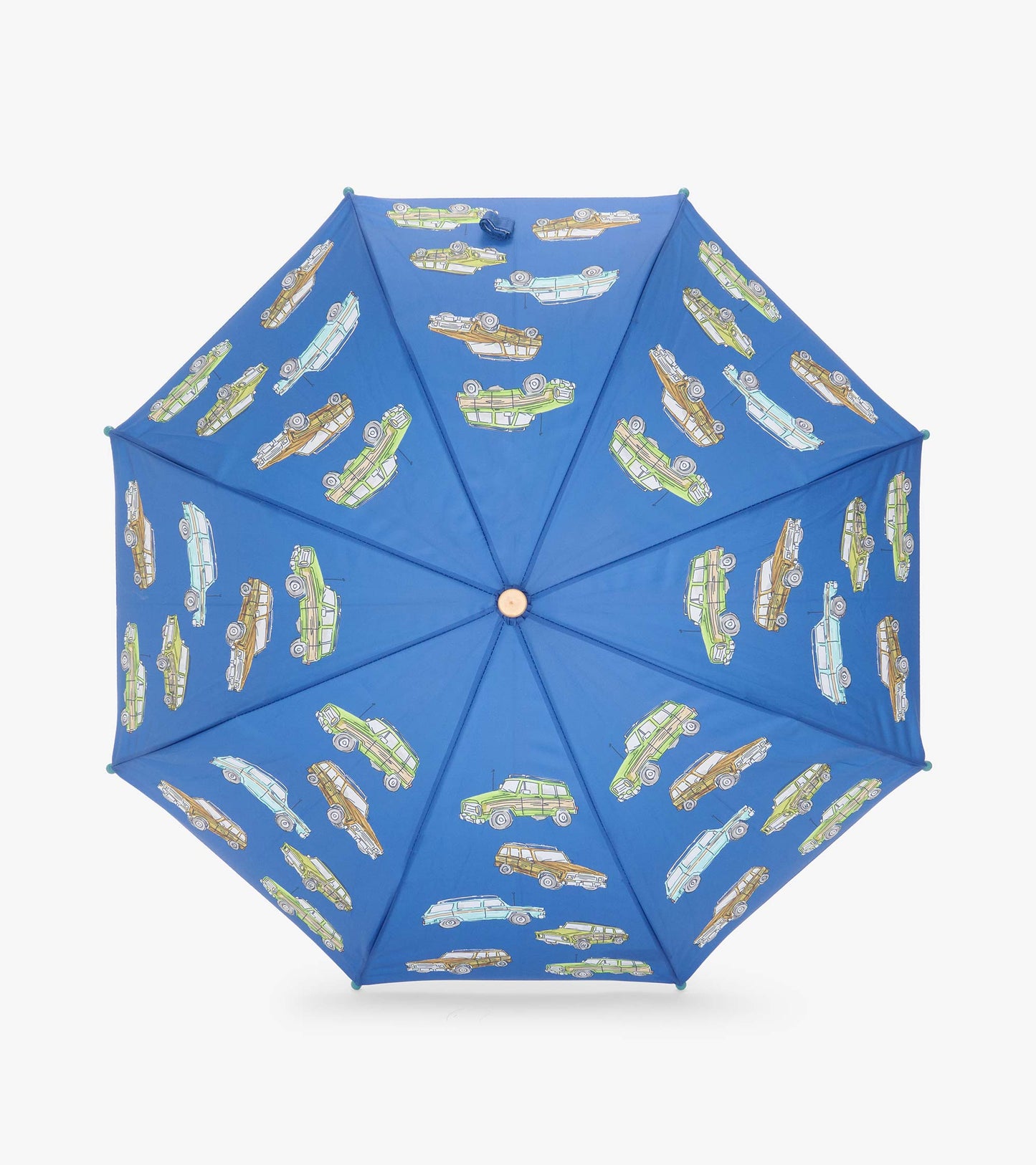 Top view of open blue umbrella with allover vintage truck print