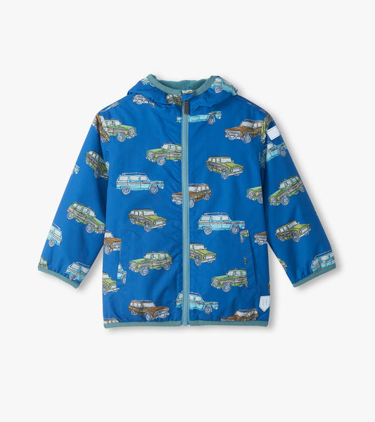 Front view of blue hooded field jacket with zipper and vintage truck print in green, brown, and light blue