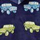 Four toy vehicles on a dark blue background, including blue and yellow cars and trucks