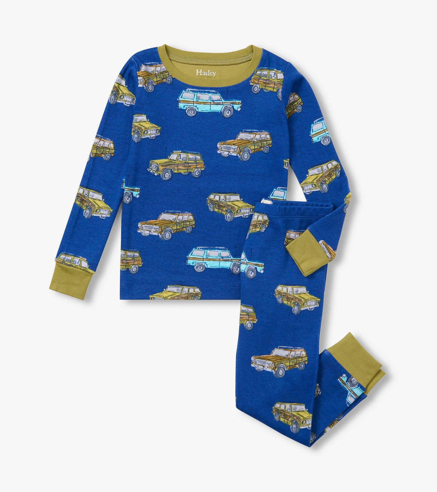 Kids blue pajama set with vintage truck print and olive green neck, wrist, and ankle cuffs
