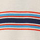 Cream fabric with horizontal red, navy, and orange stripes