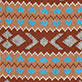 Brown and tan geometric pattern with blue zigzag accents