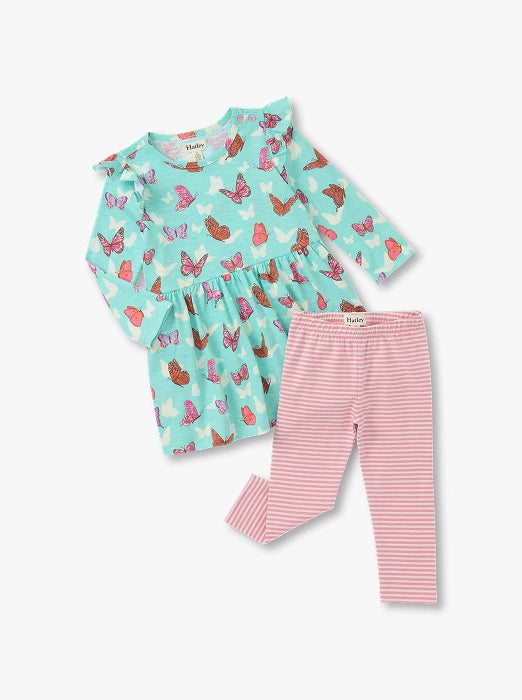 Promotes baby sale clothing. Showing mint butterfly print dress with pink striped leggings.