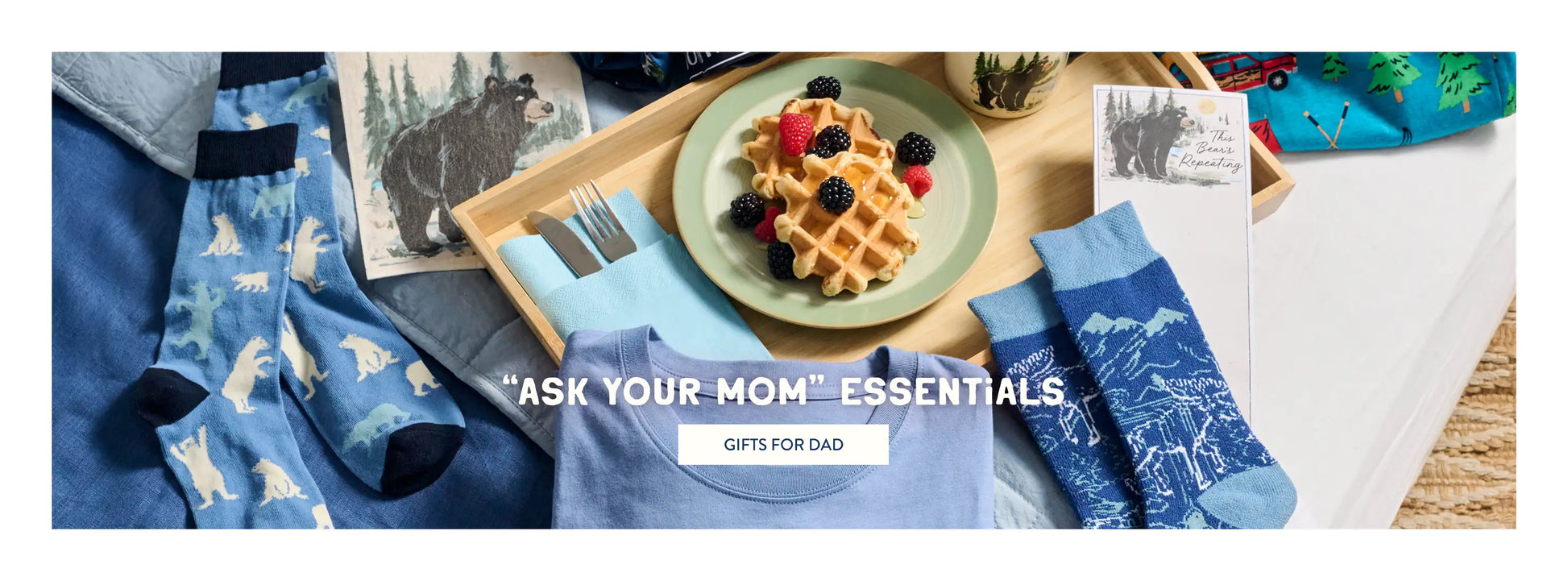 Promotes Father's Day gift shopping. With "Ask Your Mom” Essentials" text.