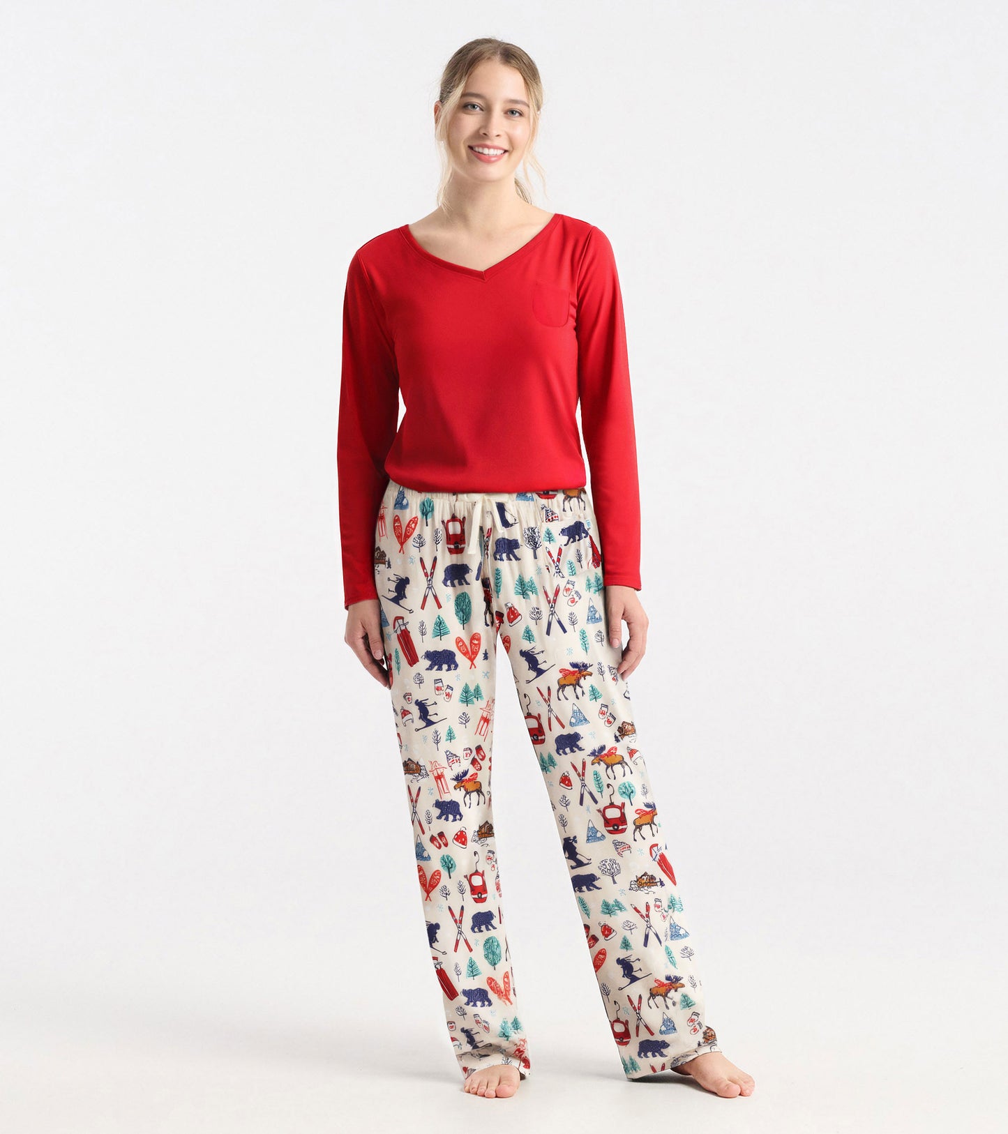 Red long sleeve t-shirt with a v-neck and pocket, paired with patterned pajama pants.