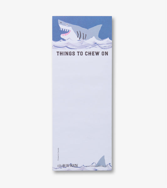 Magnetic notepad with shark illustration, blue top border, and blank white note area