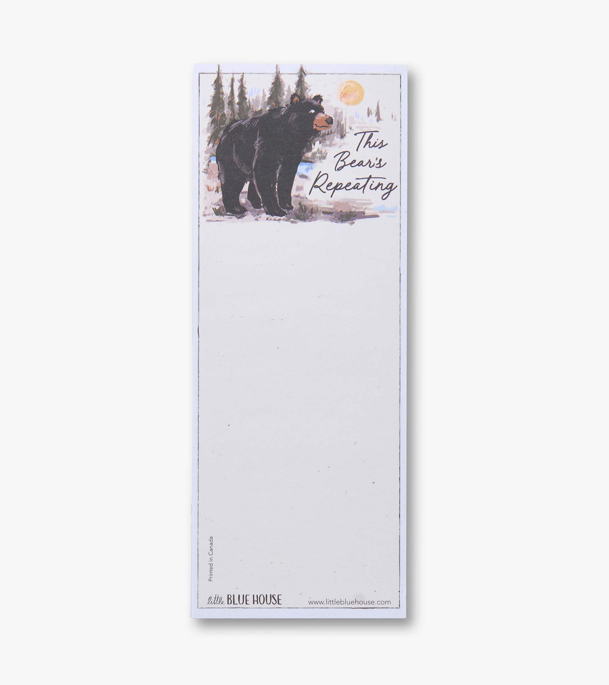Tall white magnetic notepad with bear and forest illustration at top and blank lined writing area below