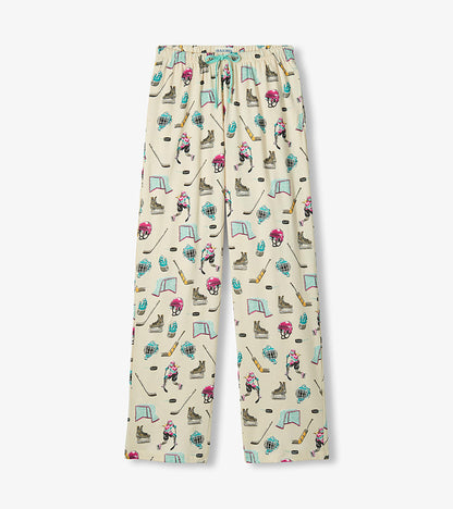 Women's hockey print pajama pants laid flat with aqua drawstring and cream background