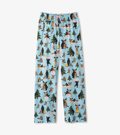 Light blue pajama pants laid flat with pink drawstring and woodland animal, tree and campfire print