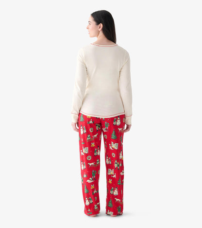 Back view of red Christmas pajama pants with vintage holiday print, shown on model