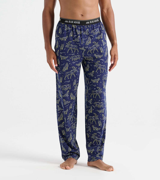 Front view of navy pajama pants with animal constellation print and black Little Blue House waistband
