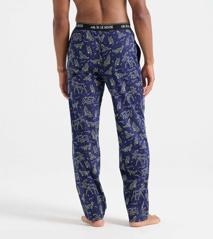 Back view of navy pajama pants with animal constellation print and black Little Blue House waistband