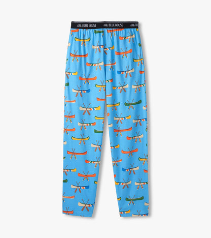 Men's blue pajama pants laid flat with colorful canoe and crossed paddle print and black logo waistband