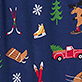 Red toy truck with green tree, skier, sleds, and snowflakes on a dark blue pattern