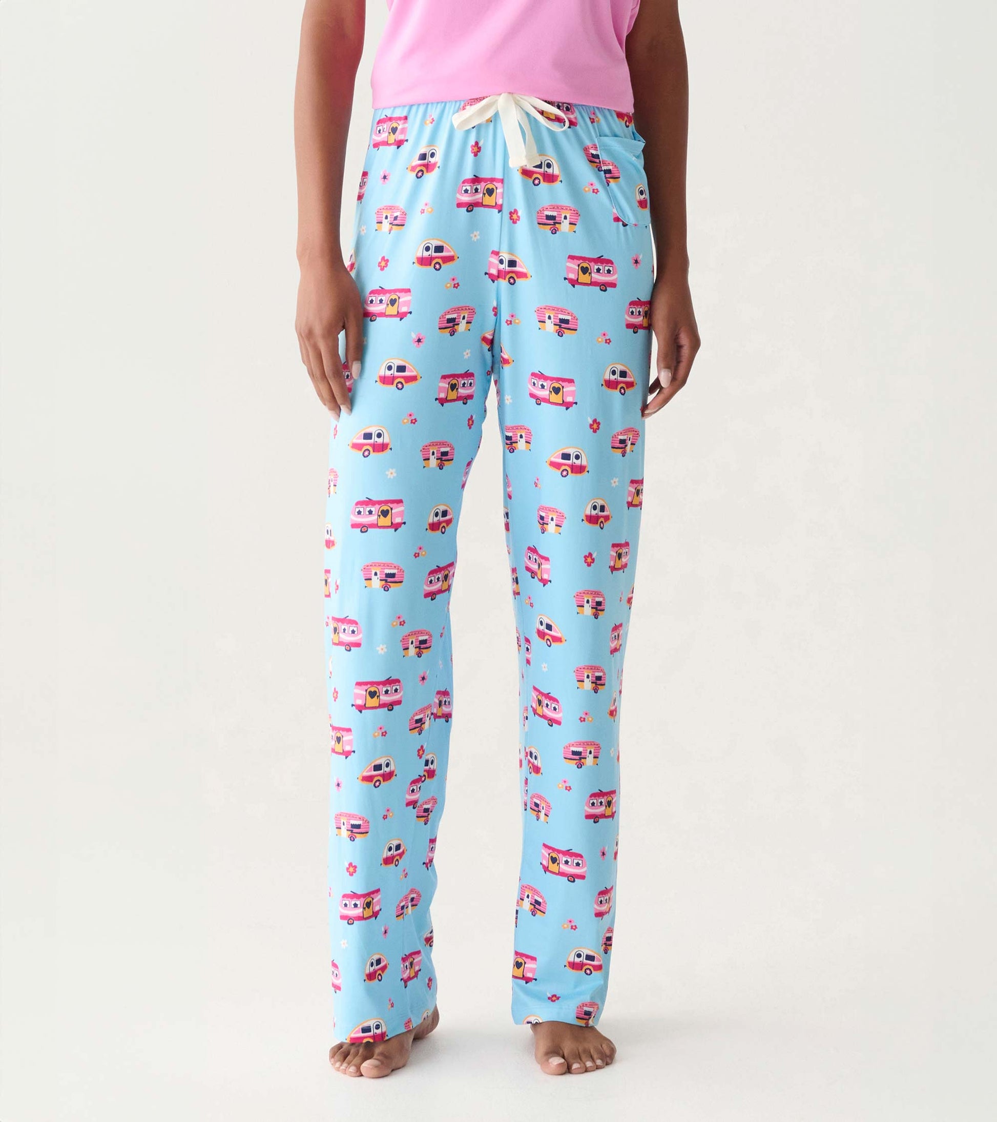 Light blue pajama pants with colorful camper print, drawstring waist, straight leg, front view