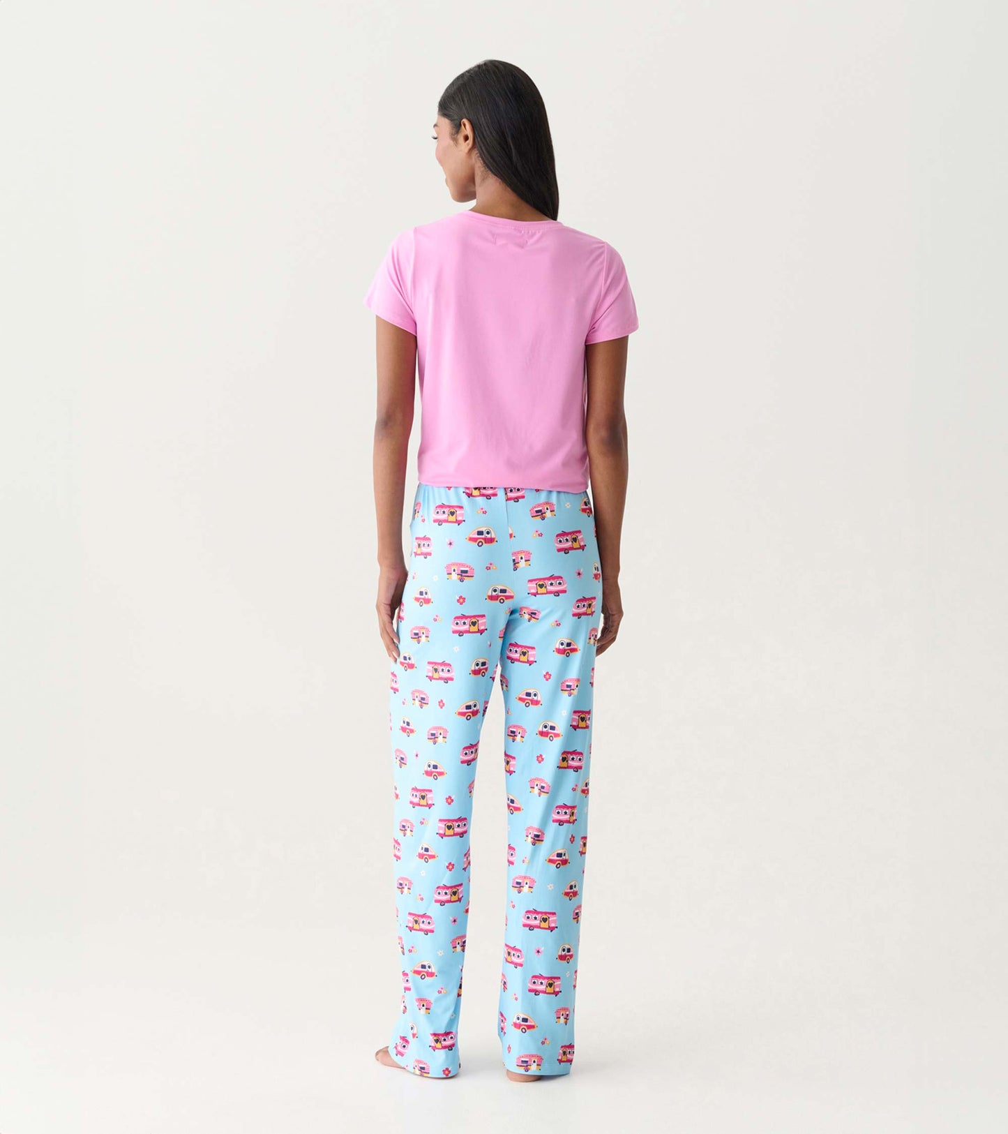 Back view of pink pajama pants with blue camper print, paired with a pink short-sleeve top