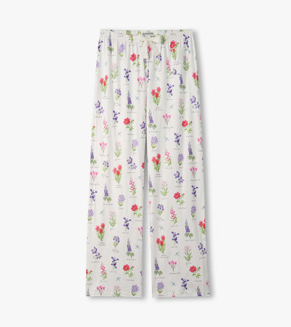 White pajama pants with colorful wildflower print and drawstring waist, front view