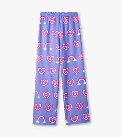 Purple polar pants featuring a playful pattern of hearts and rainbows in pink and white. Elastic waistband for comfort.