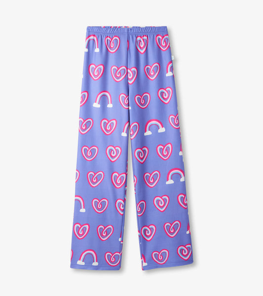 Purple polar pants featuring a playful pattern of hearts and rainbows in pink and white. Elastic waistband for comfort.