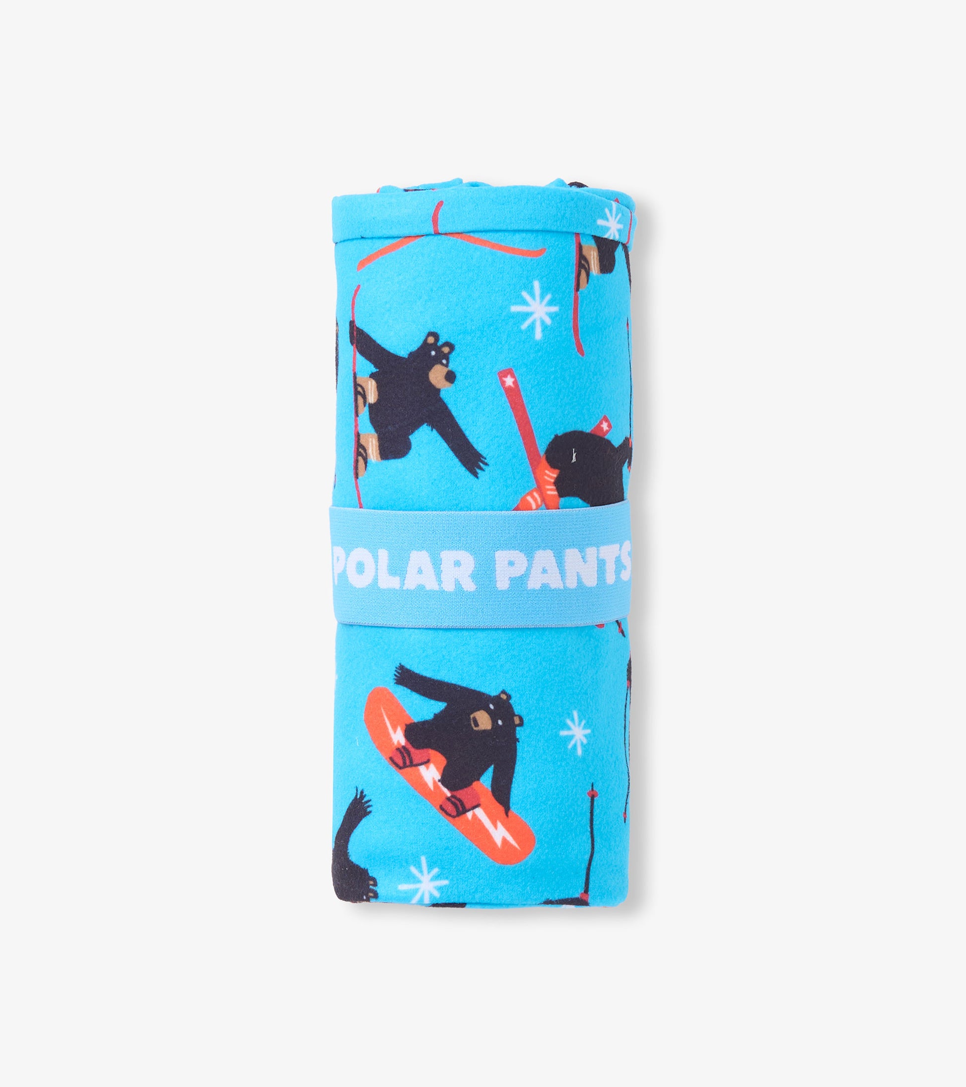 Fleece polar pants in bright blue with playful bear and snowflake patterns, rolled and secured with a band.