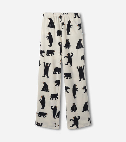 Black fleece pants featuring various bear silhouettes on a cream background, designed for comfort and casual wear.