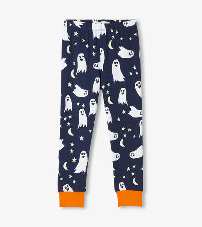 Kids ghost print pajama pants in navy with stars, crescent moons, and bright orange cuffs