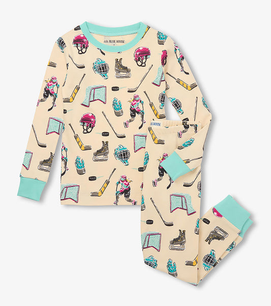 Kids hockey pajama set with cream top and pants, aqua trim, and pink and aqua hockey print
