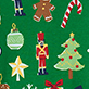Christmas-themed pattern with gingerbread man, candy cane, ornament, nutcracker, decorated tree, star, mittens, and bows