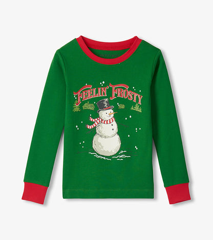 Green kids pajama top with red trim, snowman graphic, and 'Feelin' Frosty' text