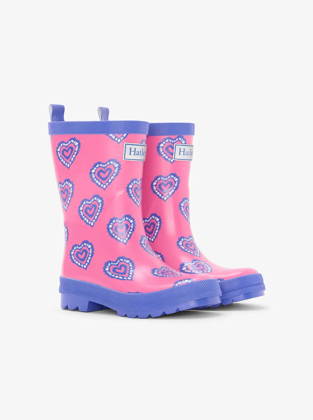 Promotes the boots collection. Showing pair of pink rain boots with blue trim and heart pattern on a white background.