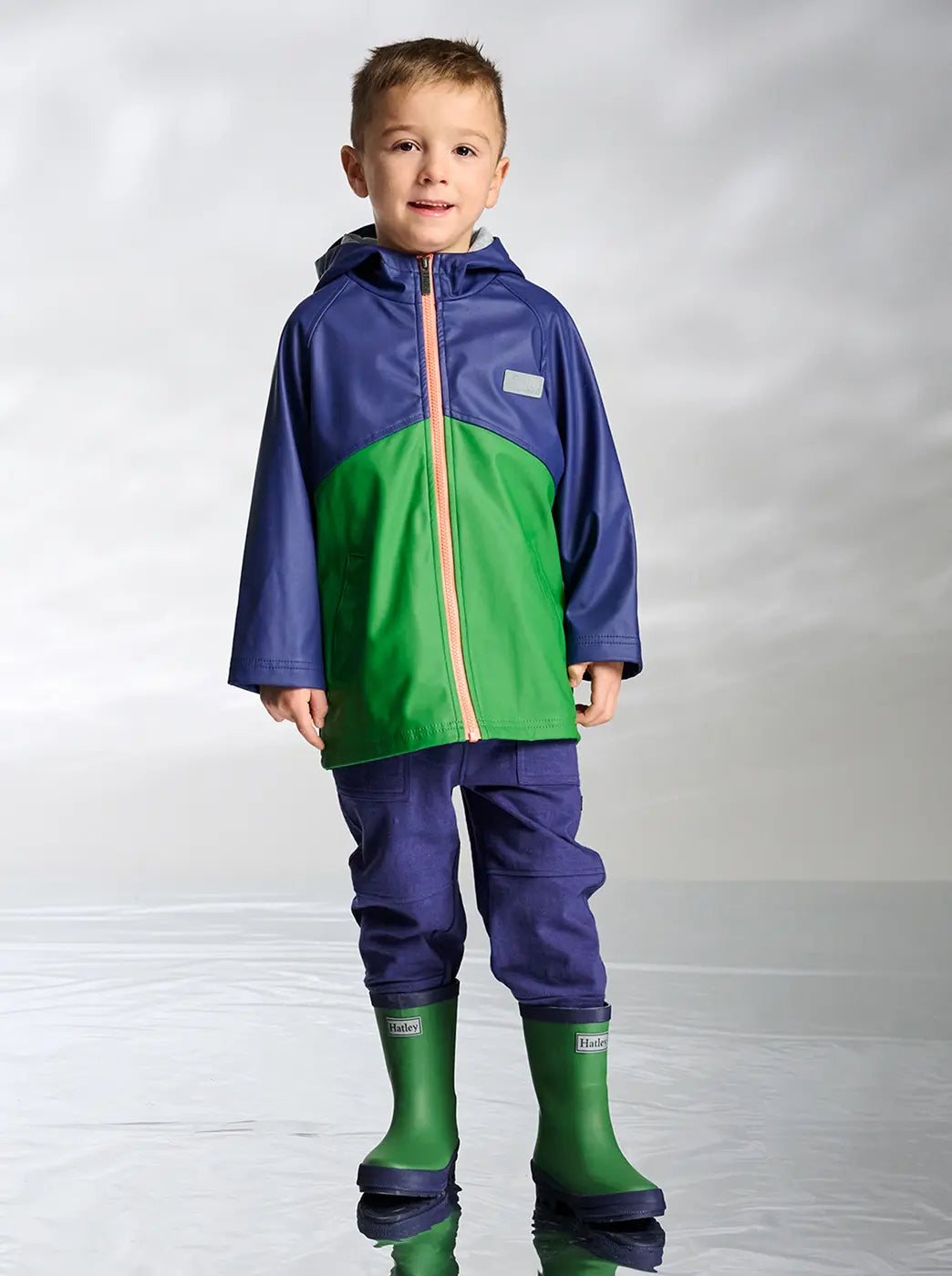 Promotes boys' rainwear collection. With "Boys" text.
