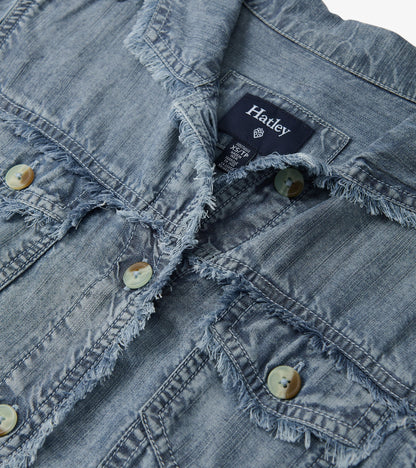 Blue acid wash linen jacket with frayed edges and button closures, featuring two front pockets.