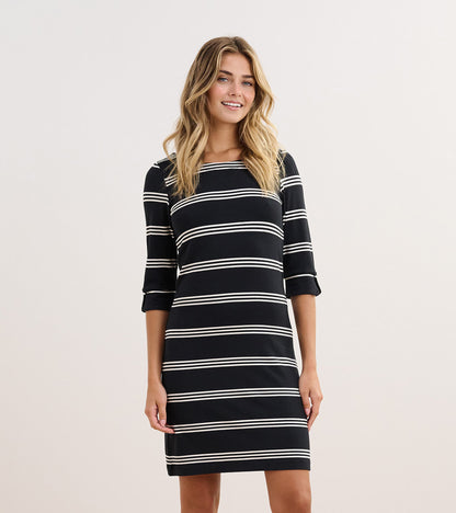 Black and white striped dress with three-quarter sleeves and a fitted silhouette, suitable for casual wear.