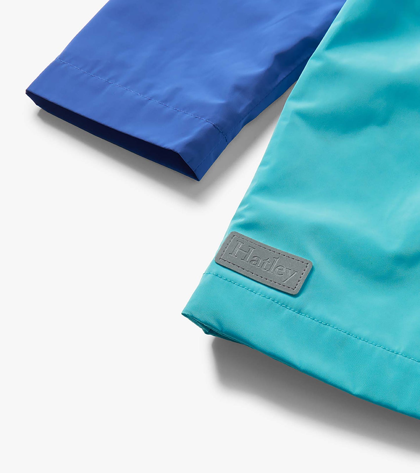 Veste de pluie doublée en jersey – Blocs de couleur bleus