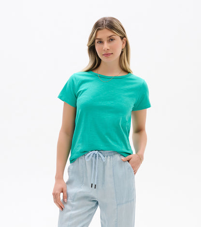 Teal short-sleeve crew neck tee on a model, front view