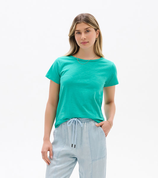 Teal short-sleeve crew neck tee on a model, front view