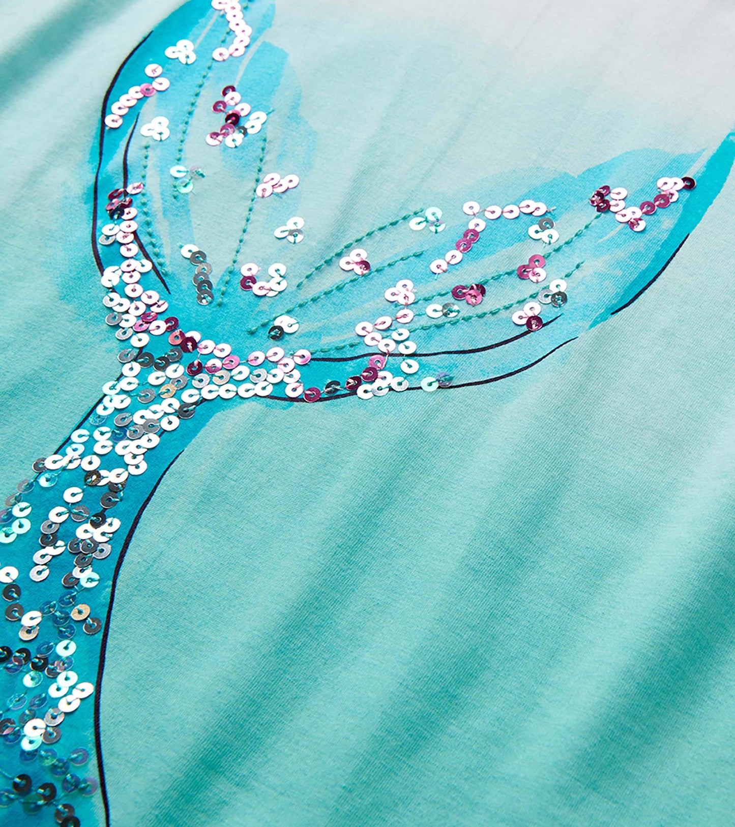 Turquoise girls top with sequined mermaid tail graphic and black outline detail