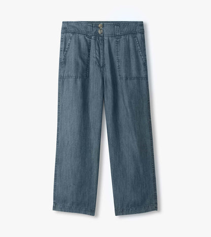 Blue wide-leg denim pants with high waist, front pockets, and button closure, shown flat front view