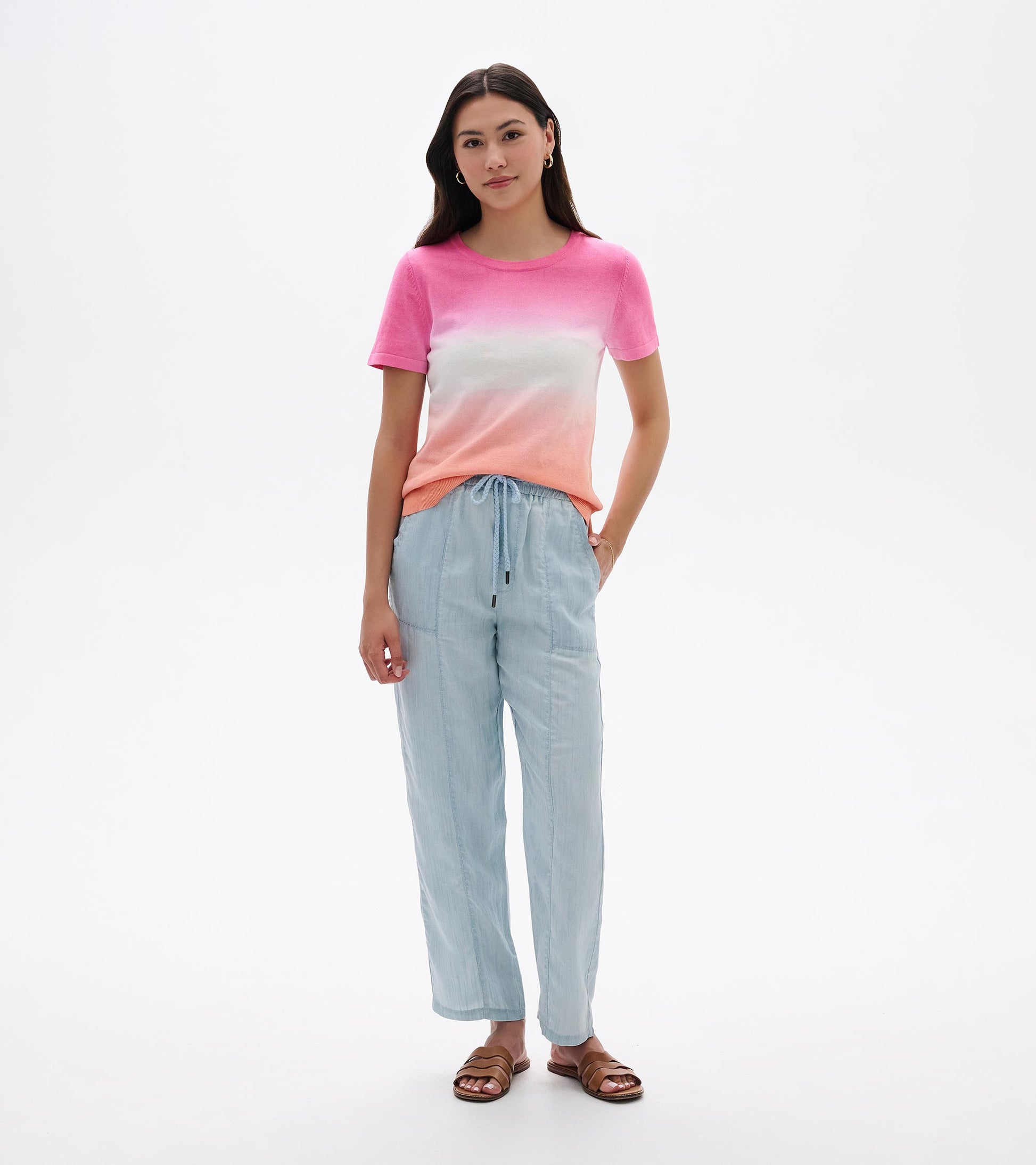 Pink and white dip-dye short-sleeve knit tee with a crew neck, shown on a model front view.
