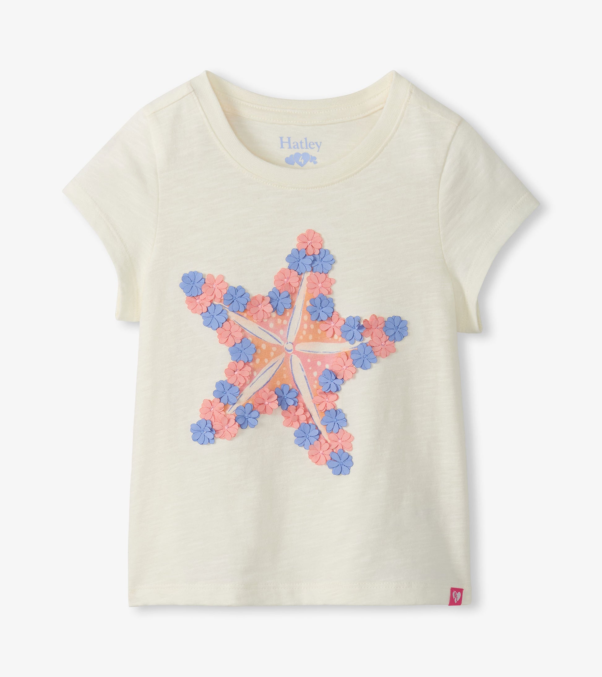 Cream short-sleeve girls tee with large pink and blue starfish graphic, front view