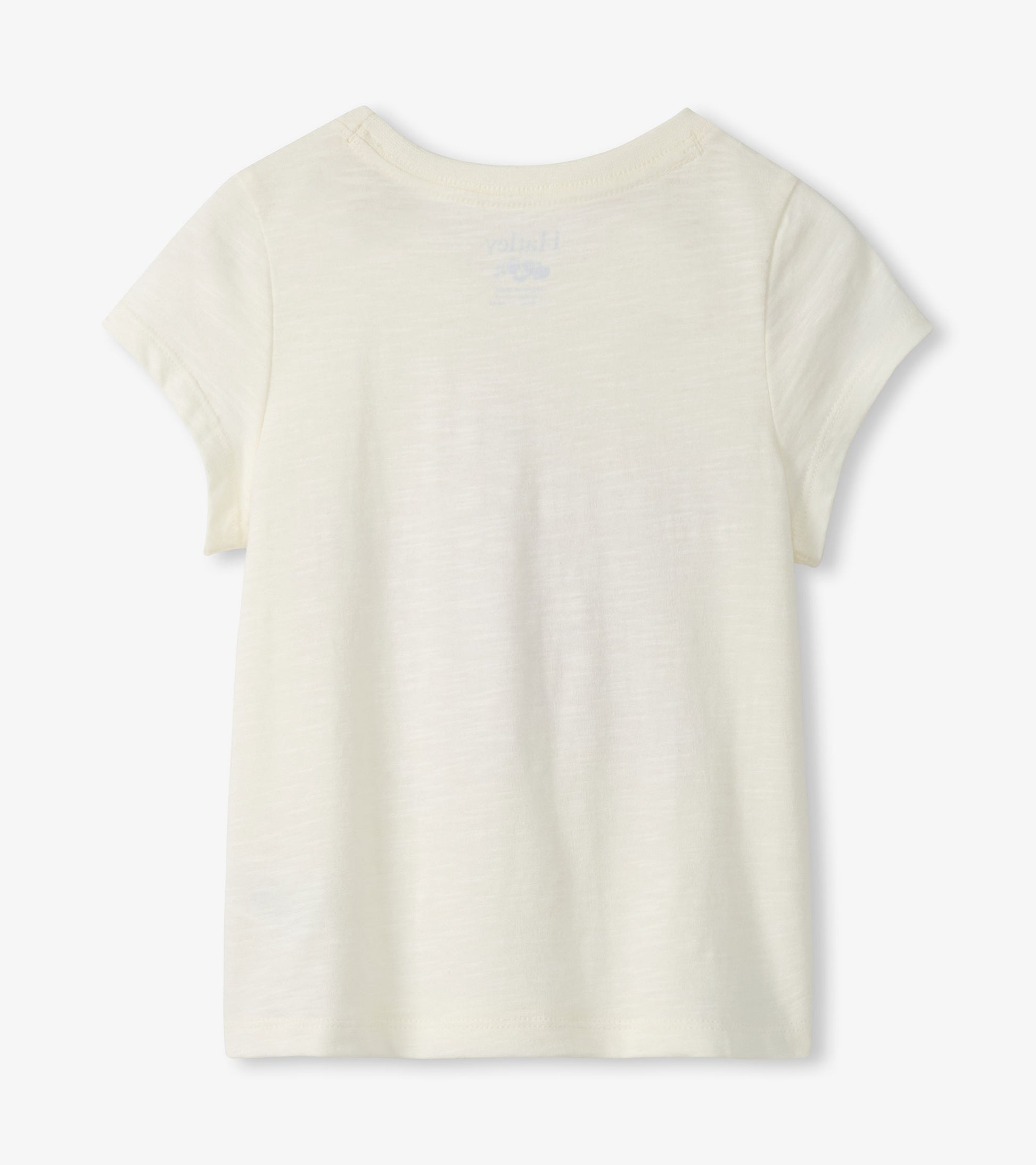 Cream short-sleeve girls T-shirt with a small starfish graphic on the back neckline, front view